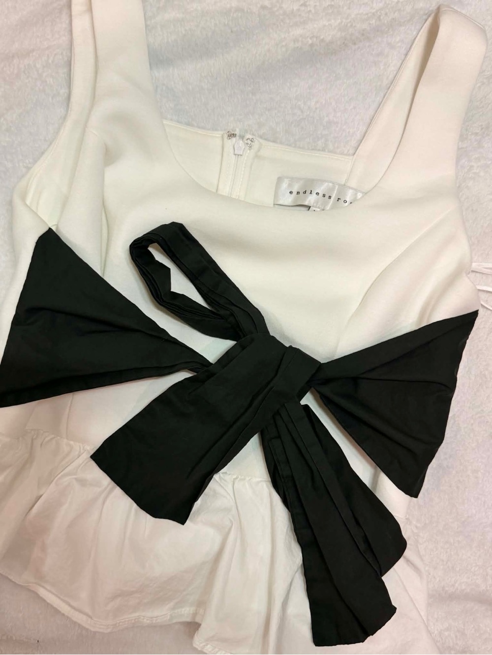 Endless Rose White Sleeveless Dress with Black Bow Accent